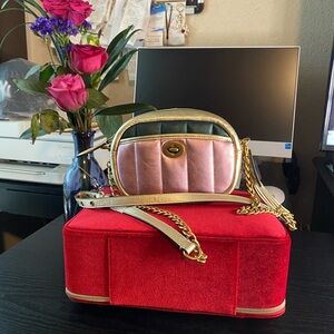 New Never used Coach Dinky, metallic colorblock crossbody bag.